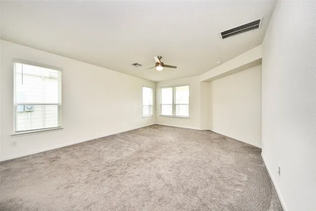 a bathroom with a tub a sink and a shower