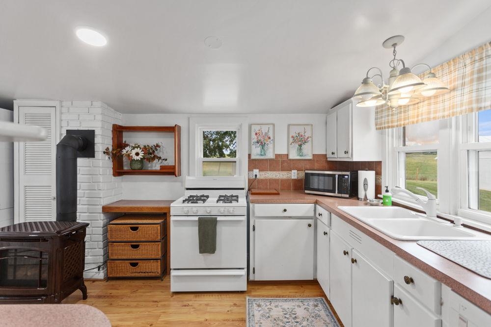 1533 Concord Church Road Timberville, VA 22853 - Photo 12 of 33 with propane heater and cook stove.