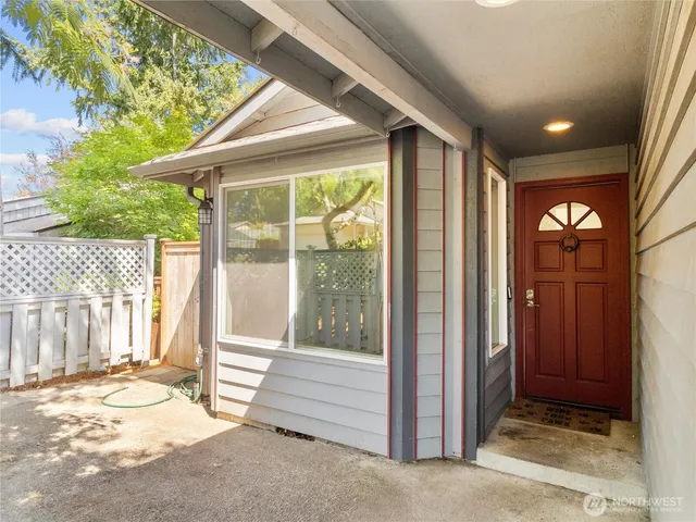 a porch with a table in balcony