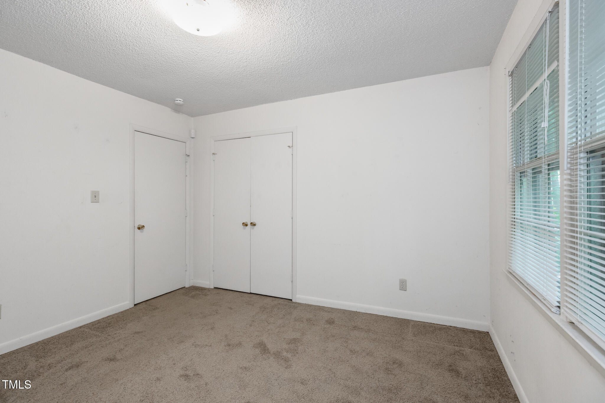1809-1811 Quail Ridge Road Raleigh, NC 27609 - Photo 26 of 32 a view of an empty room