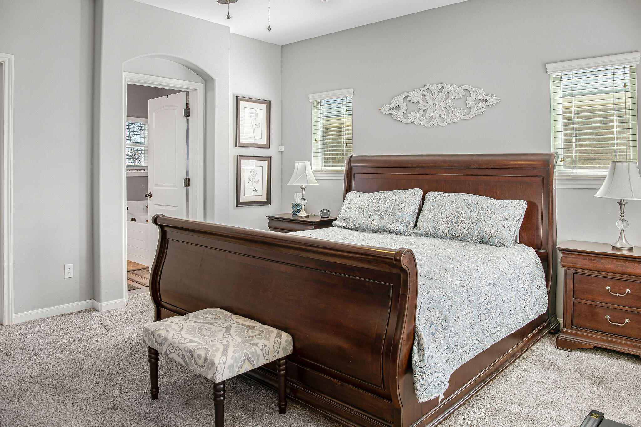 10117 Chicago Avenue Lubbock, TX 79424 - Photo 26 of 36 a bedroom with a bed and a table in it