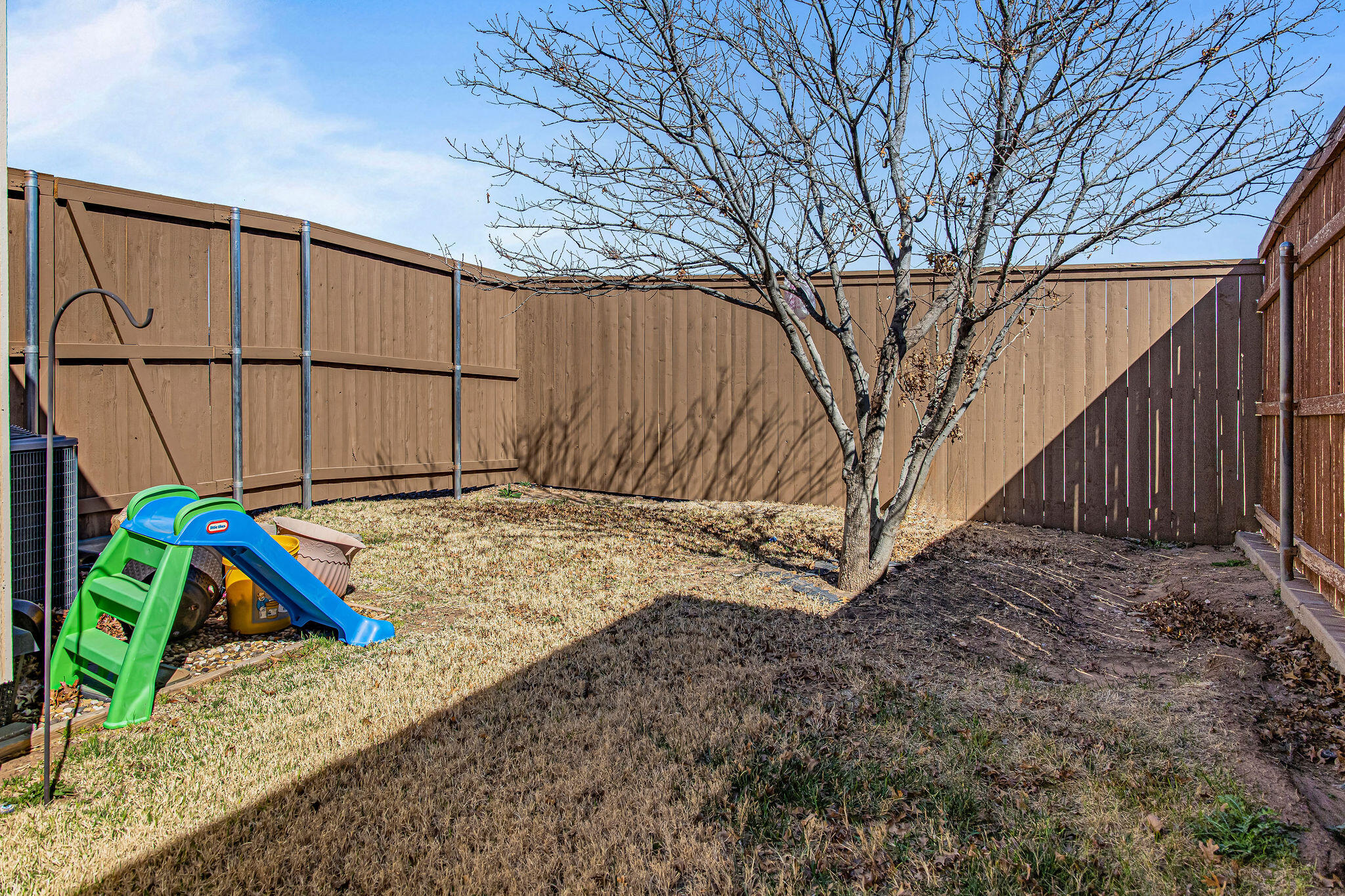 10117 Chicago Avenue Lubbock, TX 79424 - Photo 35 of 36 a view of outdoor space with wooden fence
