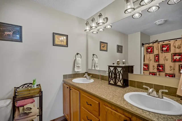 a bedroom with a bed furniture and a window