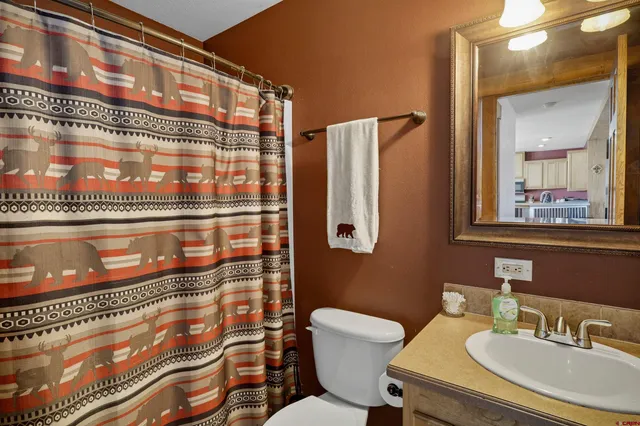 a view of balcony with wooden floor and city view