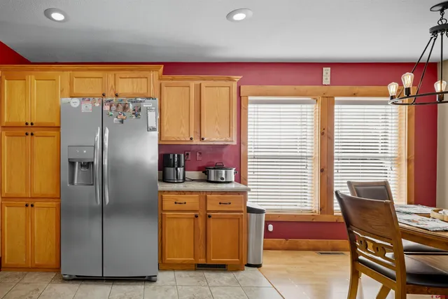 a view of a hallway with a room