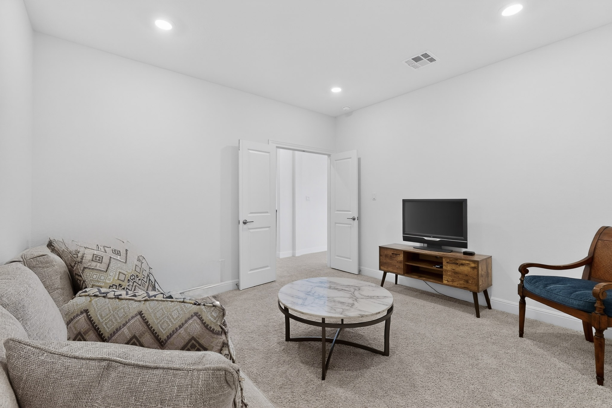 249 Running Bird Road Austin, TX 78737 - Photo 27 of 40 Media Room featuring light colored carpet and recessed lighting