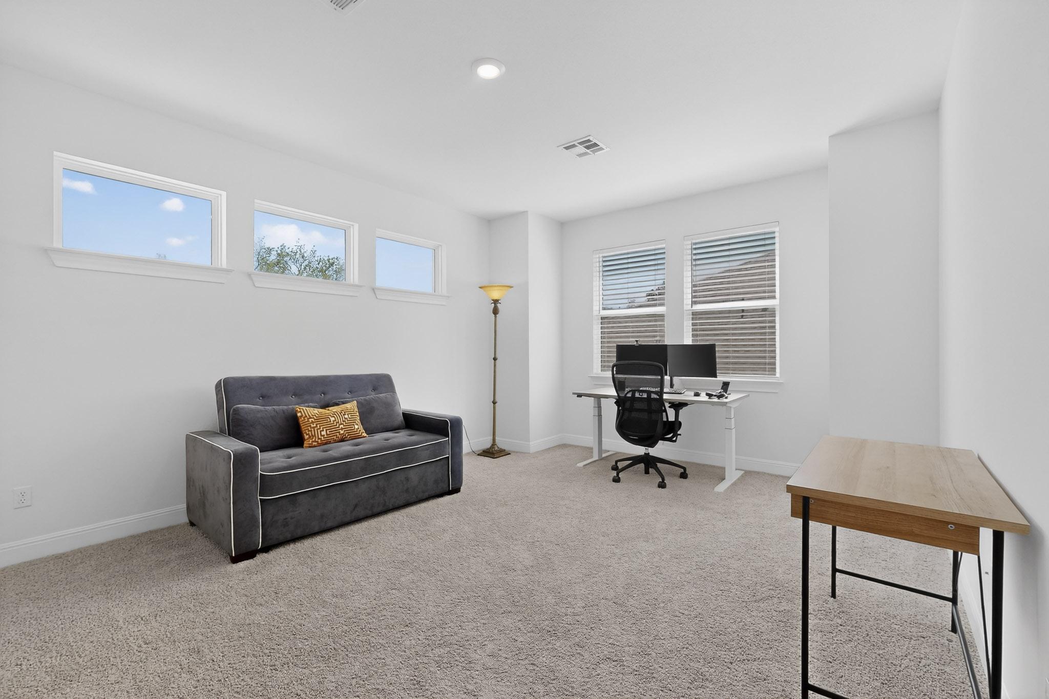 249 Running Bird Road Austin, TX 78737 - Photo 28 of 40 Game Room featuring light colored carpet and baseboards