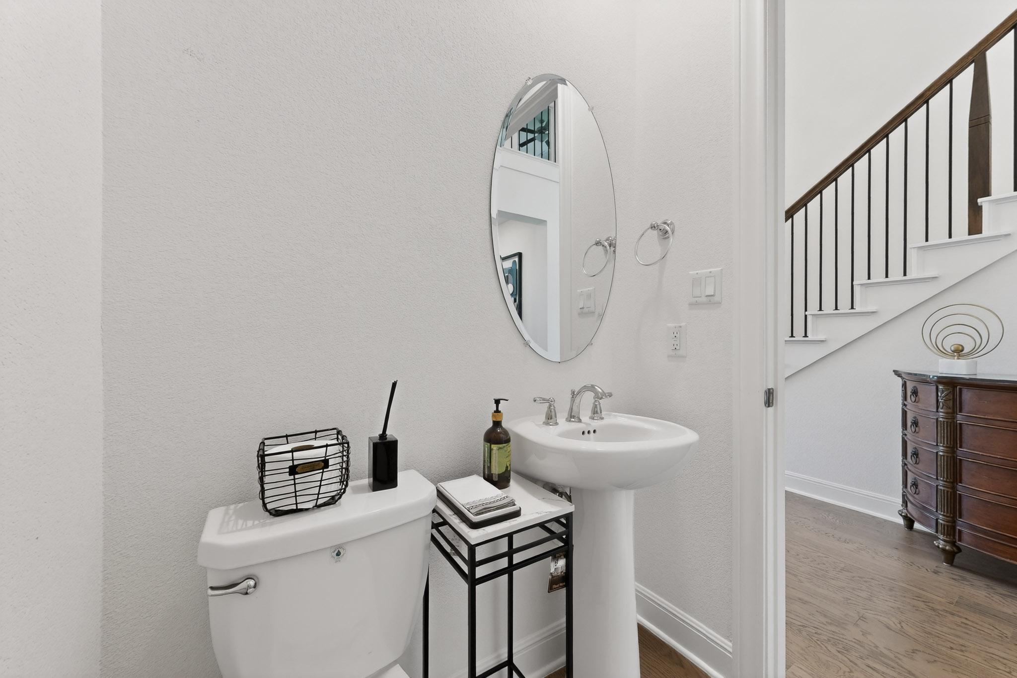 249 Running Bird Road Austin, TX 78737 - Photo 29 of 40 Bathroom with wood finished floors and toilet