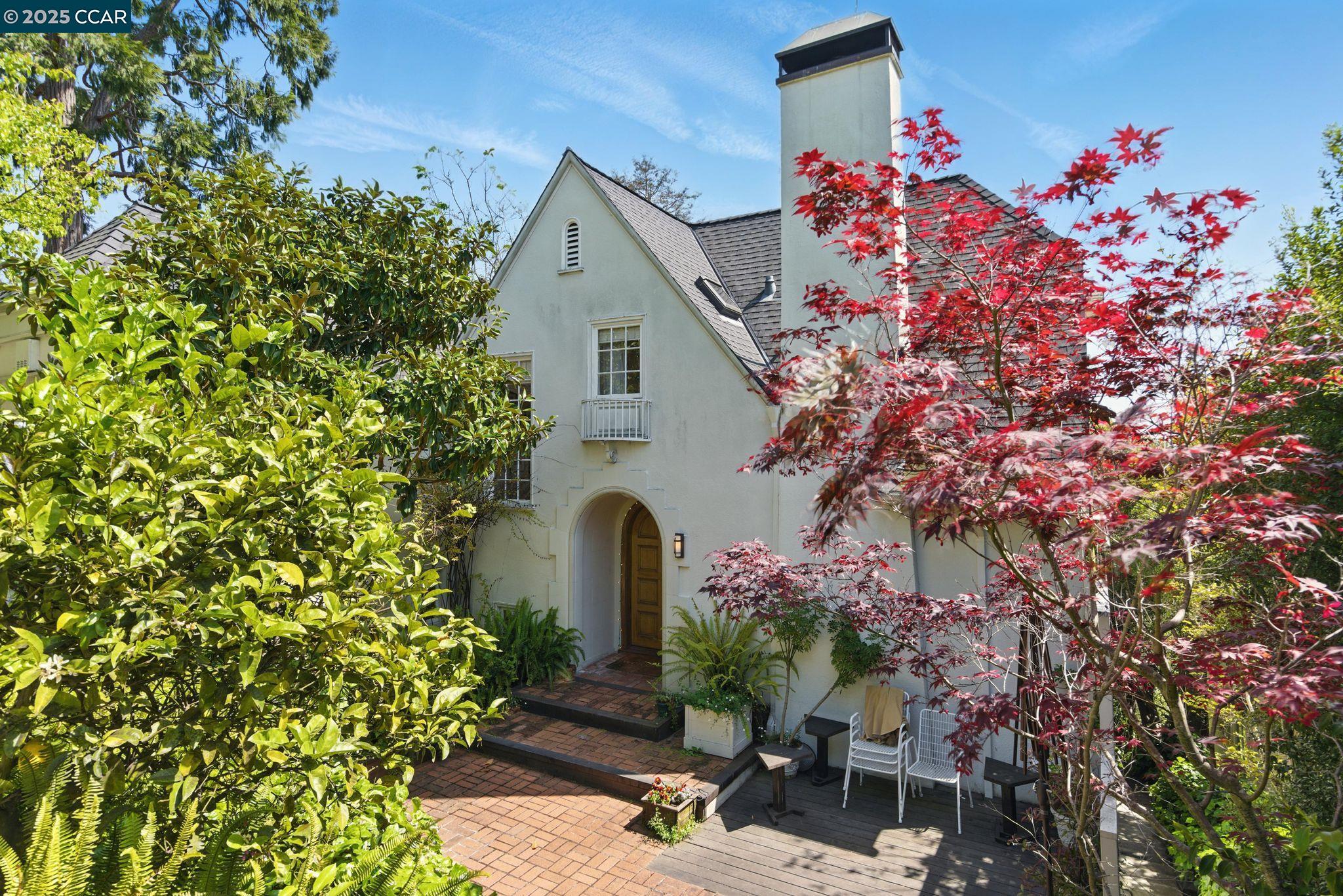 200 Hillcrest Road Berkeley, CA 94705 - Photo 1 of 1 a front view of a house with a yard and tree