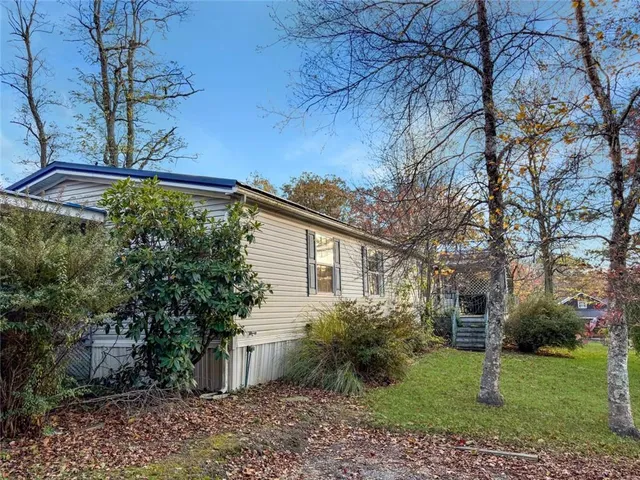 a view of a back yard of the house
