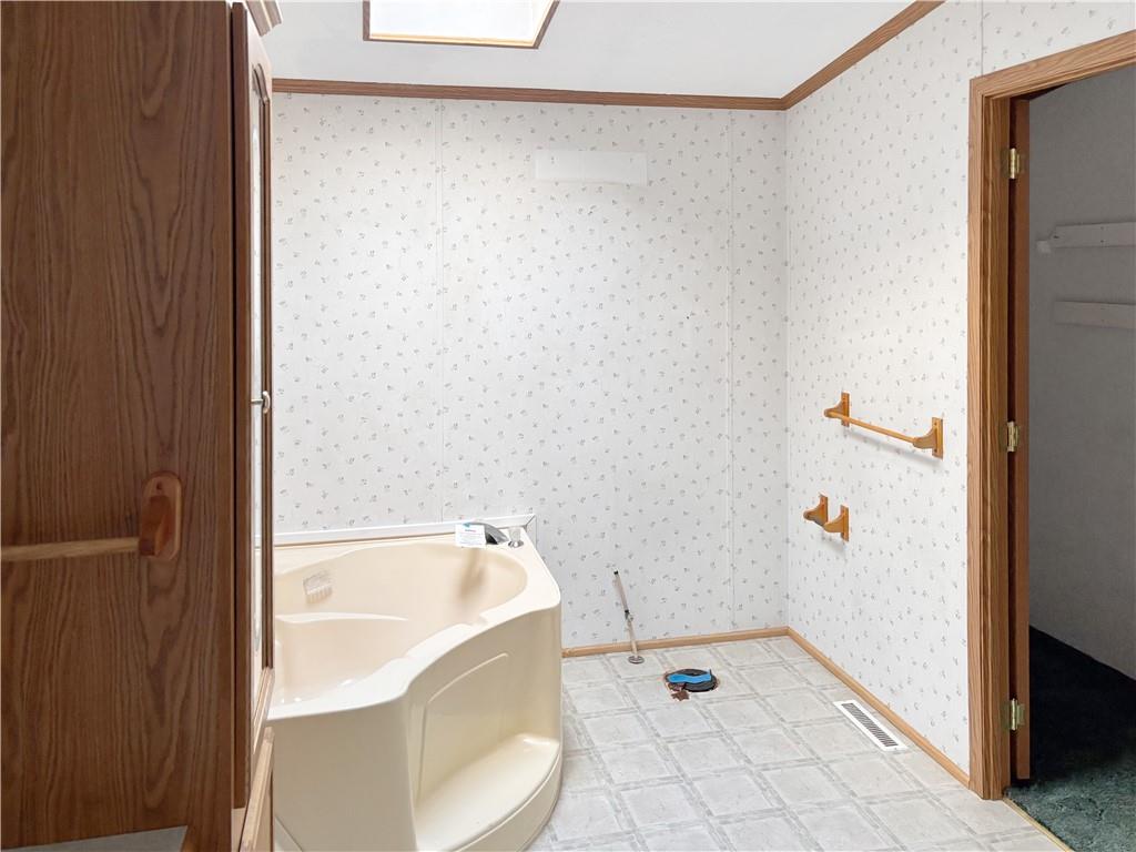 626 Quemahoning Street Boswell, PA 15531 - Photo 17 of 18 a bathroom with a bathtub and a shower
