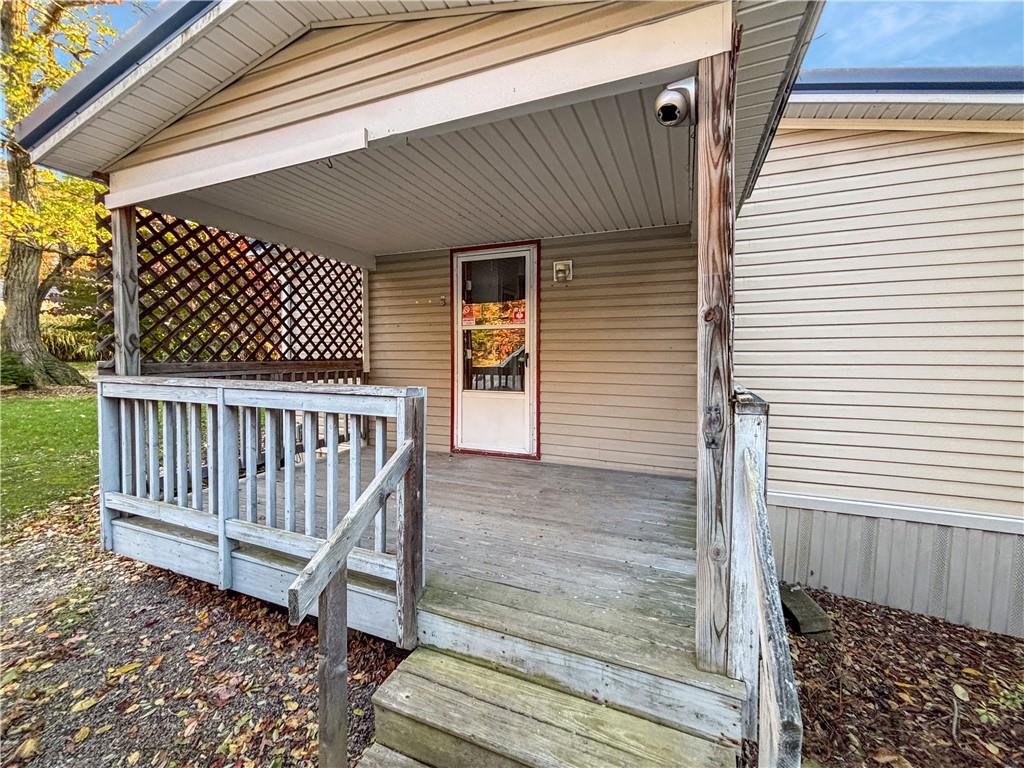 626 Quemahoning Street Boswell, PA 15531 - Photo 2 of 18 a view of a wooden door with a bench