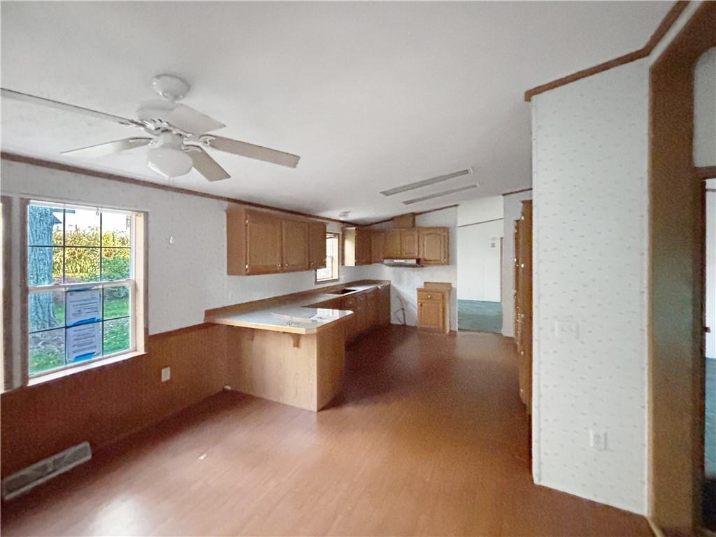 626 Quemahoning Street Boswell, PA 15531 - Photo 8 of 18 a kitchen with a refrigerator and a window
