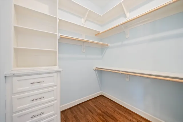 a view of an empty walk in closet