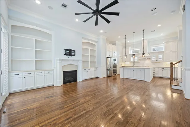 a view of a kitchen with furniture and a fireplace