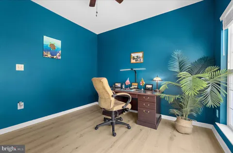a kitchen with a table and chairs in it