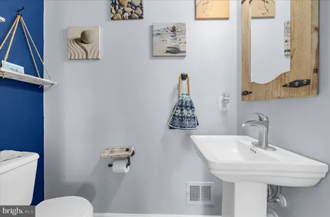 a bedroom with a bed and a cabinets