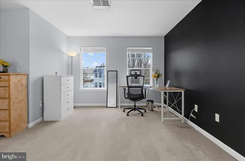 a view of a deck with a table and chairs and wooden floor