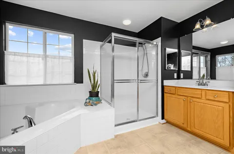 a front view of house with yard and outdoor seating