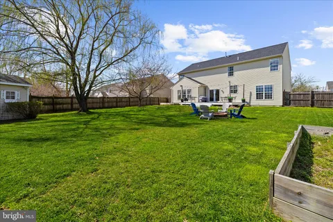 a bench sitting in front of a building