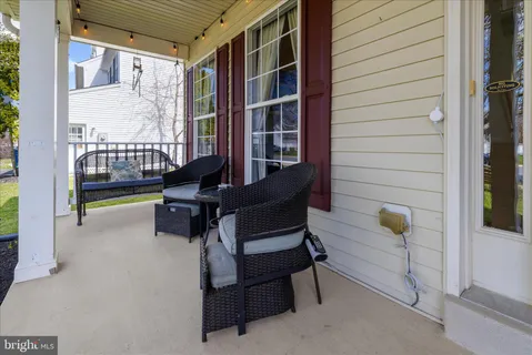 a workspace with furniture and a window