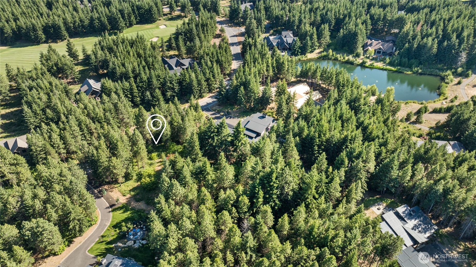 711 Ruby King Loop Cle Elum, WA 98922 - Photo 15 of 27 a view of a lake with a park