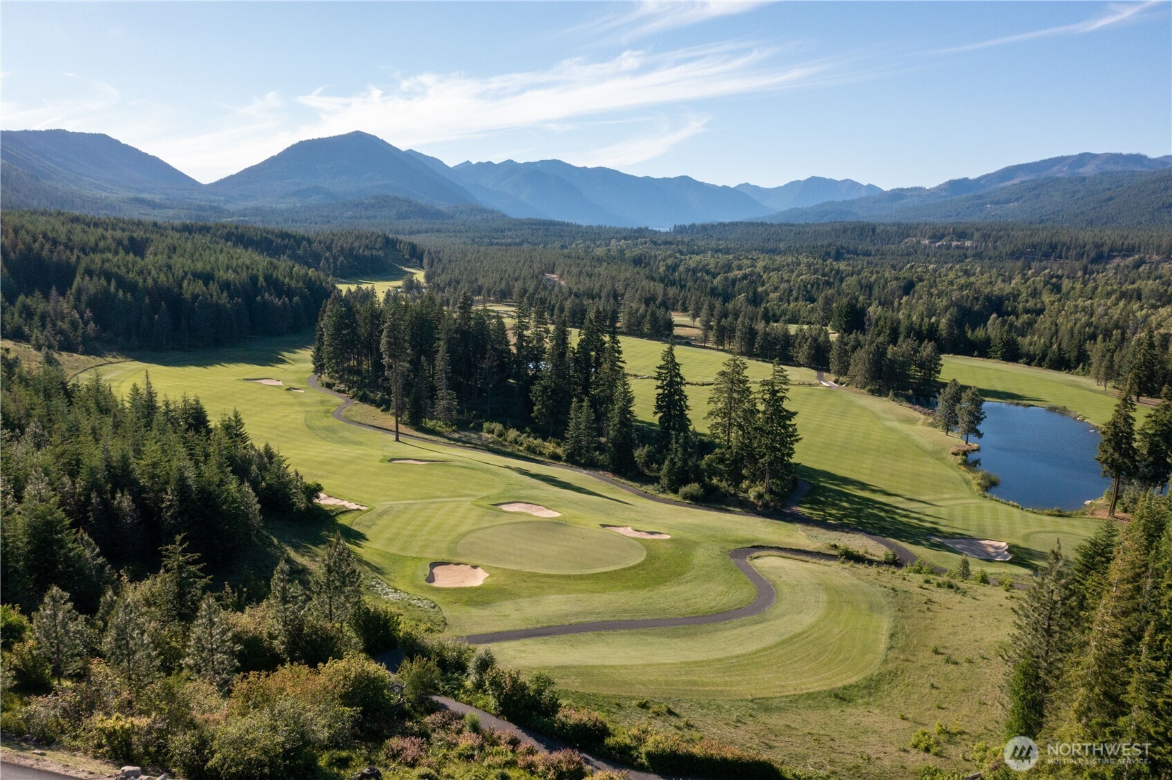 711 Ruby King Loop Cle Elum, WA 98922 - Photo 23 of 27 a view of a swimming pool with a lake view