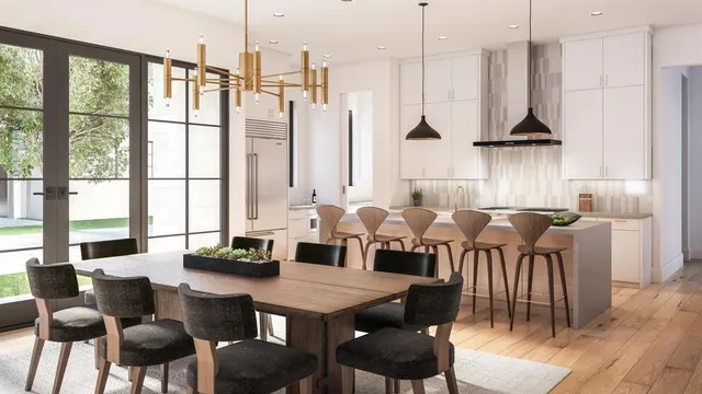 a view of a dining room and livingroom with furniture wooden floor a chandelier