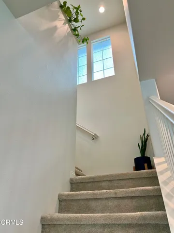 a bathroom with a sink vanity and a mirror
