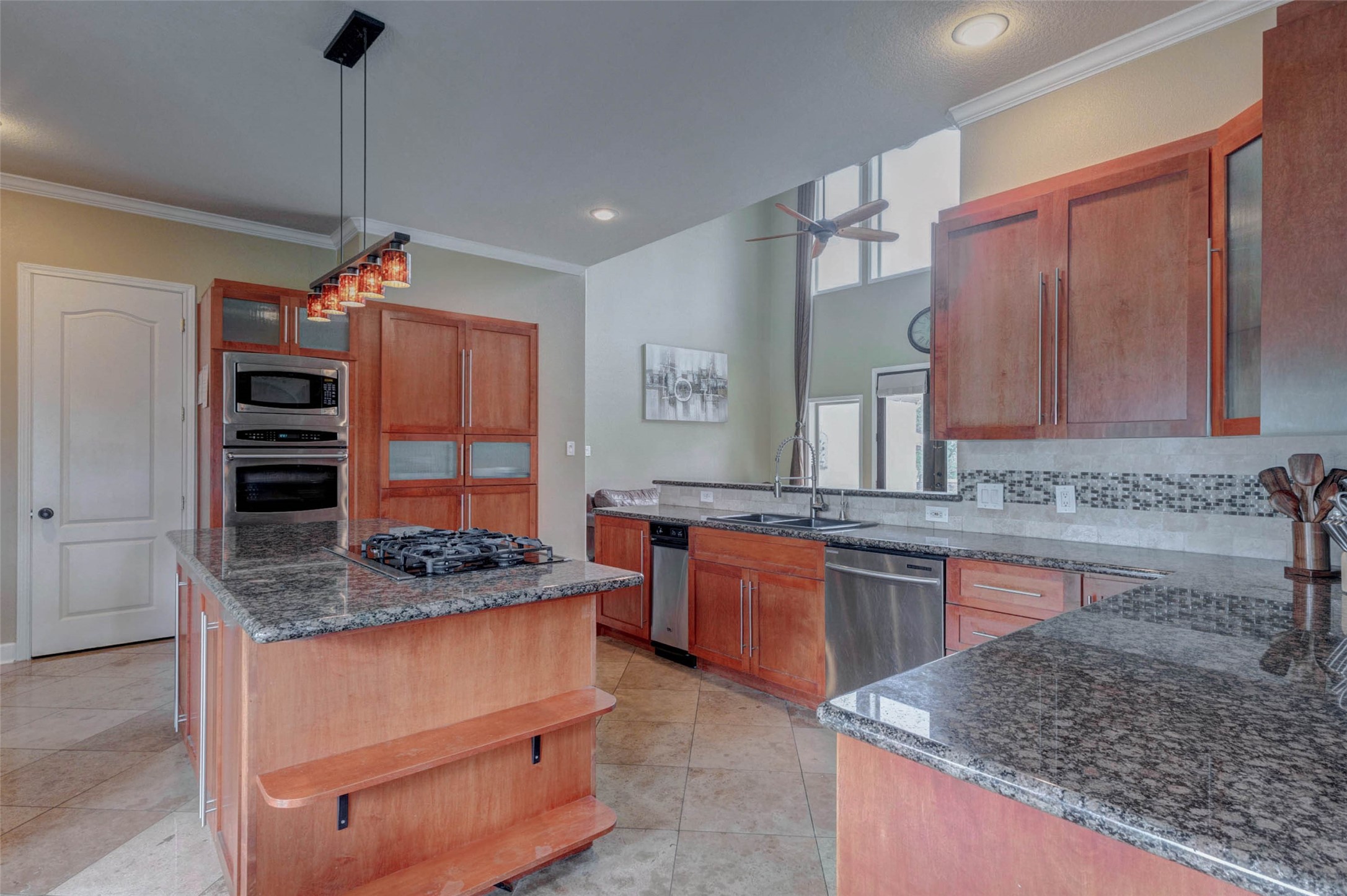 5610 Westerham Weston Lakes, TX 77441 - Photo 11 of 47 a kitchen with stainless steel appliances granite countertop a sink stove and refrigerator