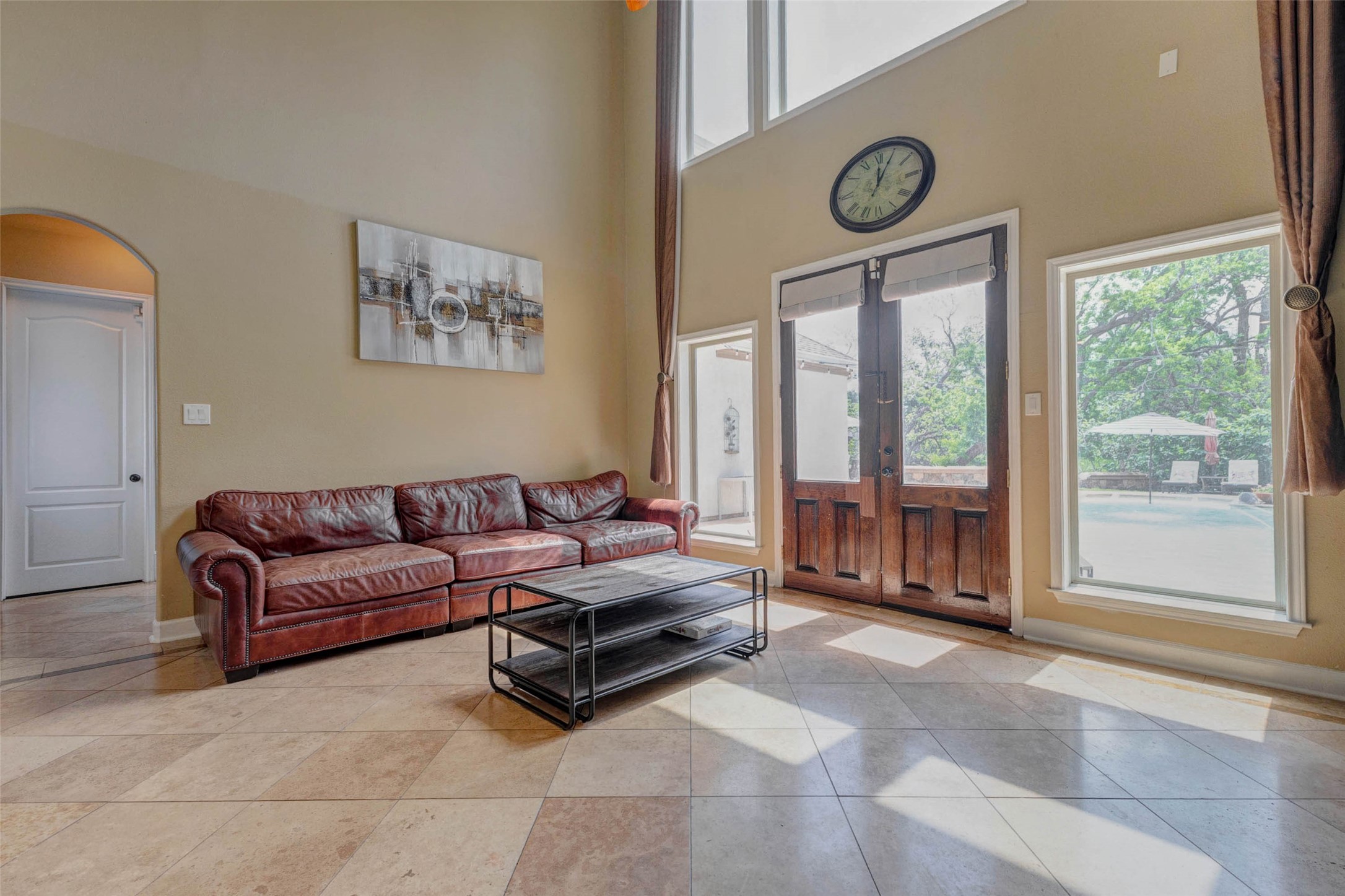 5610 Westerham Weston Lakes, TX 77441 - Photo 16 of 47 a living room with furniture and a large window