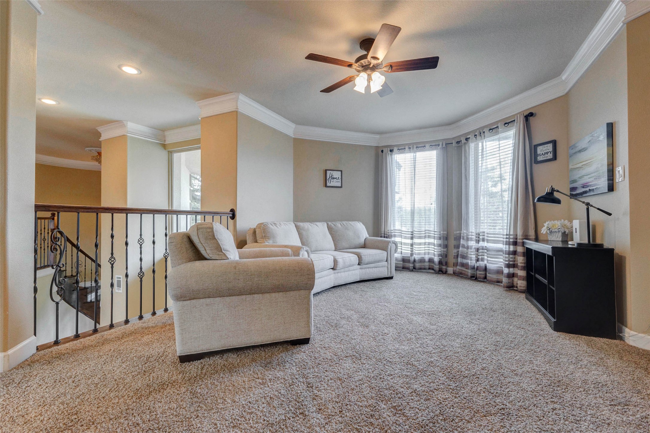 5610 Westerham Weston Lakes, TX 77441 - Photo 26 of 47 a living room with furniture and a chandelier