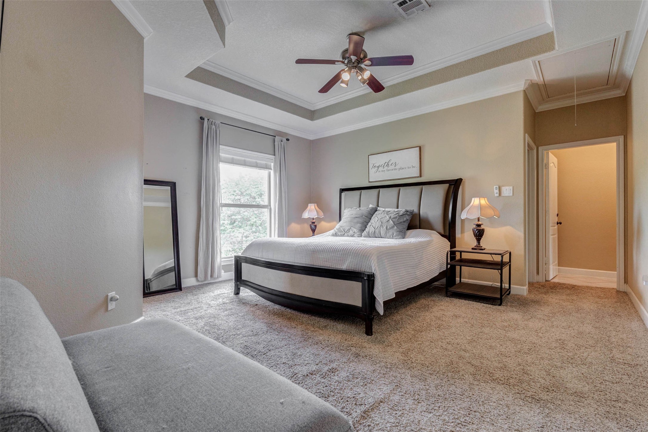 5610 Westerham Weston Lakes, TX 77441 - Photo 29 of 47 a bedroom with a bed and a ceiling fan
