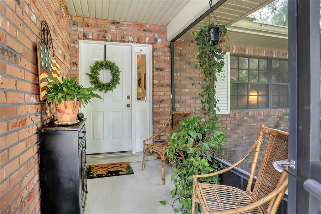 2192 Fireside Road Deltona, FL 32738 - Photo 3 of 39 Screened Front Porch