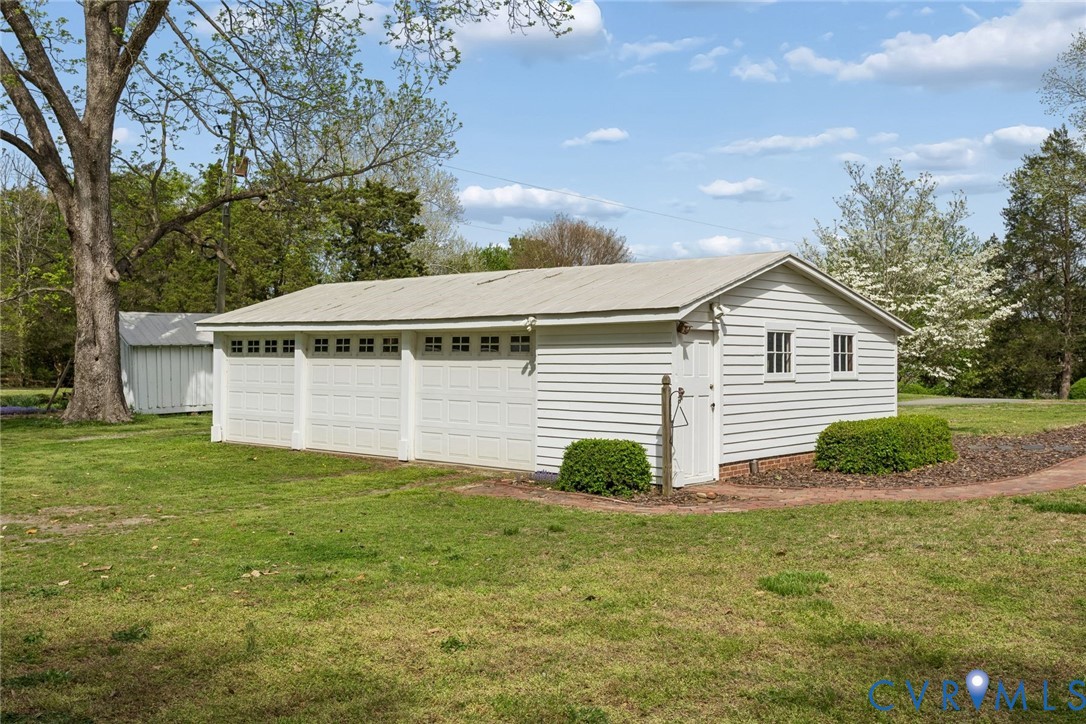 1685 Sweet Hall Road West Point, VA 23181 - Photo 13 of 47 The 3 car garage with workshop. 23 x 36