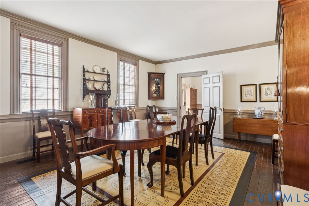 1685 Sweet Hall Road West Point, VA 23181 - Photo 19 of 47 The formal dining room with a fire place and water