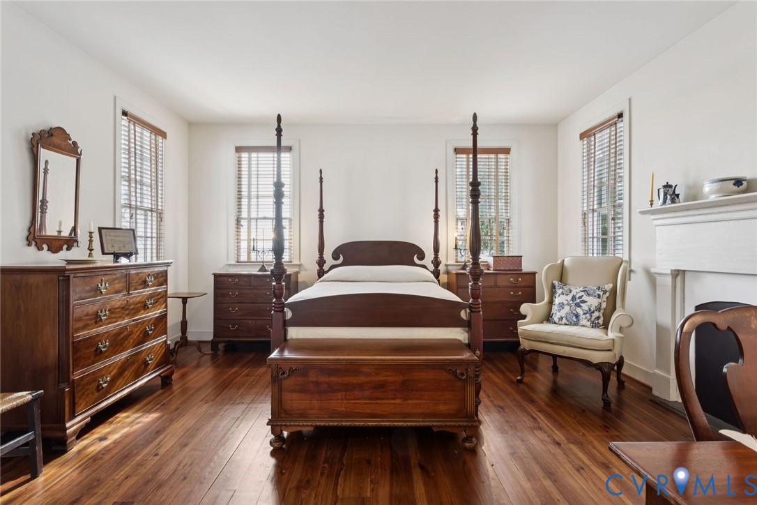 1685 Sweet Hall Road West Point, VA 23181 - Photo 27 of 47 Water front primary bedroom with deck off the side