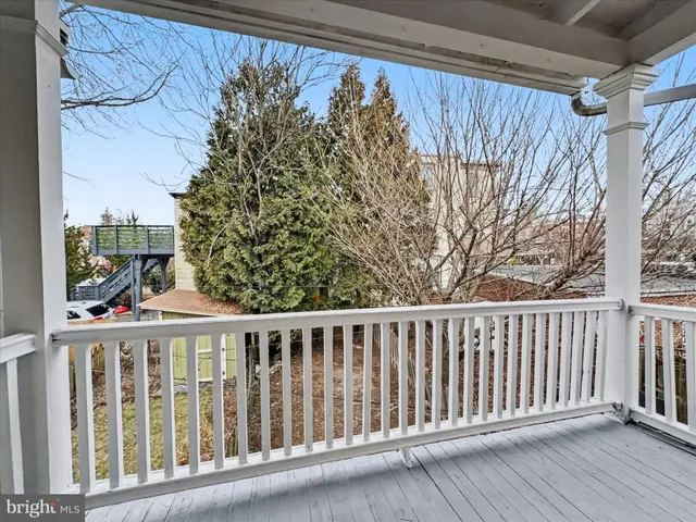 a view of a wooden fence