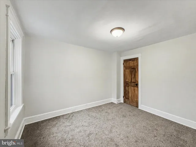 an empty room with a natural light