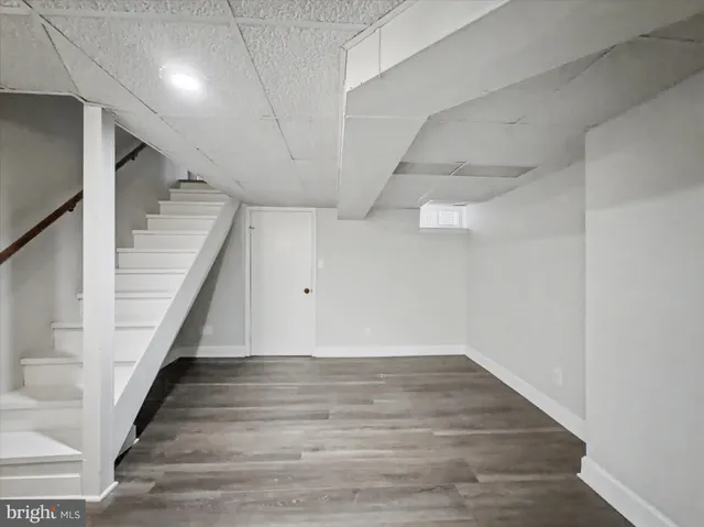 a view of a hallway with staircase