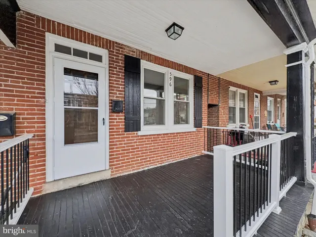 a view of a house with deck and deck
