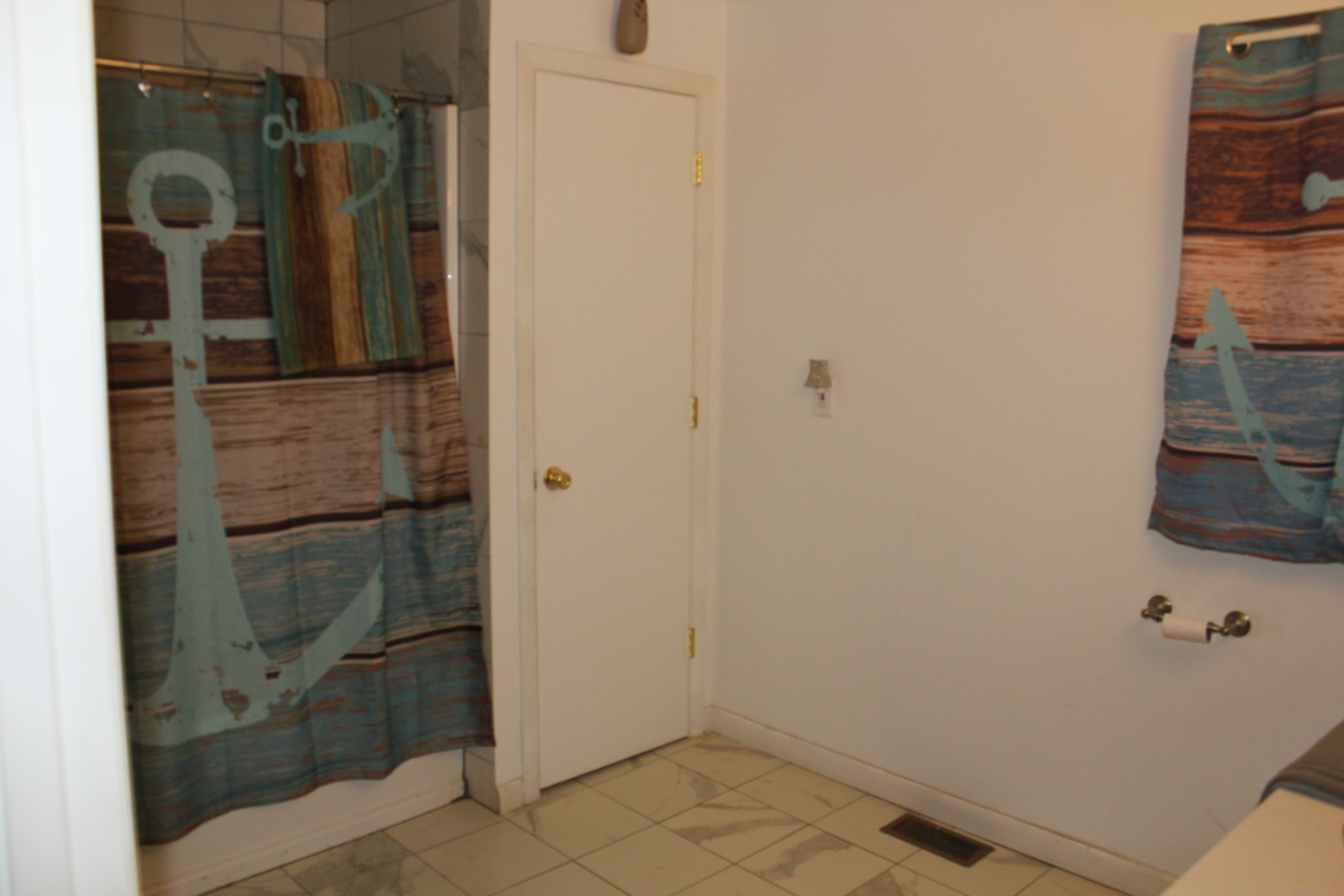 205 Locust Road Erin, TN 37061 - Photo 16 of 17 a bathroom with a shower