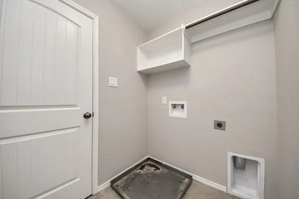 a view of empty room with windows