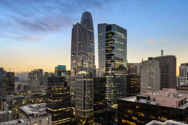 a view of a city with tall buildings