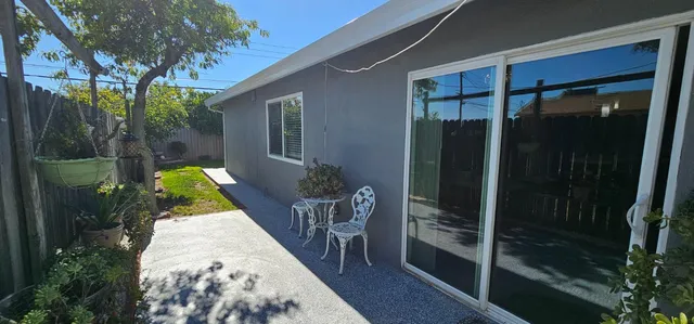a view of a balcony with door