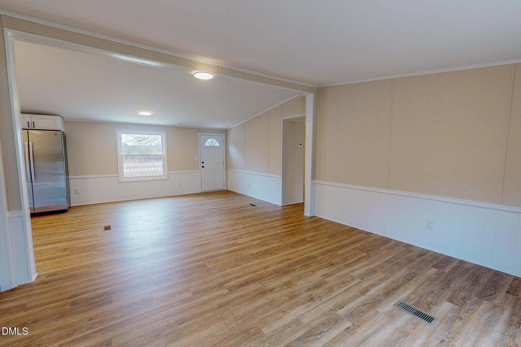 67 Halifax Road Roxboro, NC 27574 - Photo 23 of 48 a view of empty room with wooden floor and window