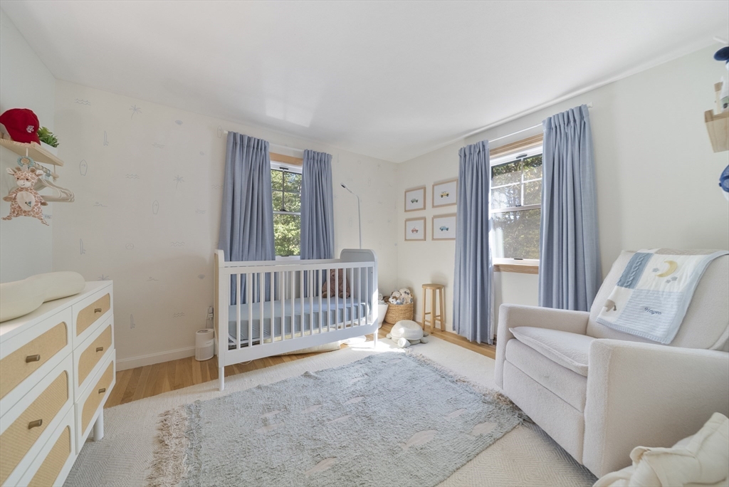 41 Searle Street Georgetown, MA 01833 - Photo 13 of 26 a living room with furniture and a window