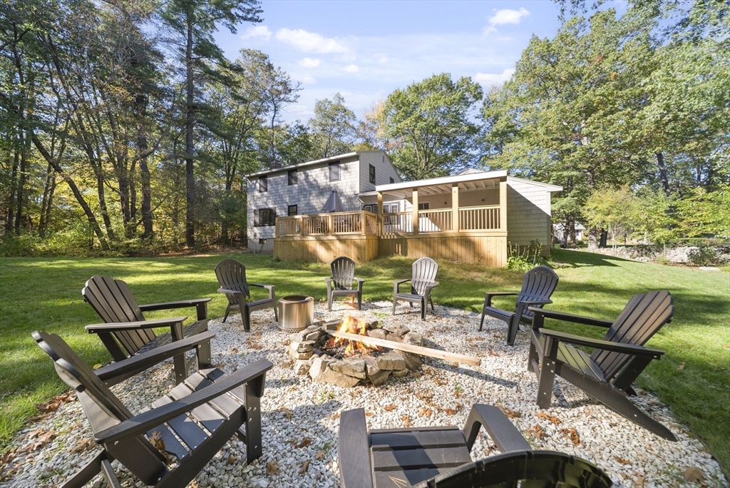 41 Searle Street Georgetown, MA 01833 - Photo 18 of 26 an outdoor sitting area with couch and chairs