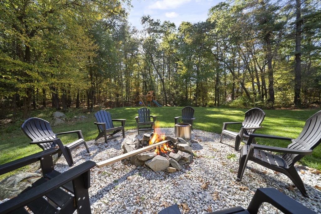 41 Searle Street Georgetown, MA 01833 - Photo 19 of 26 a view of a chairs and table in the garden