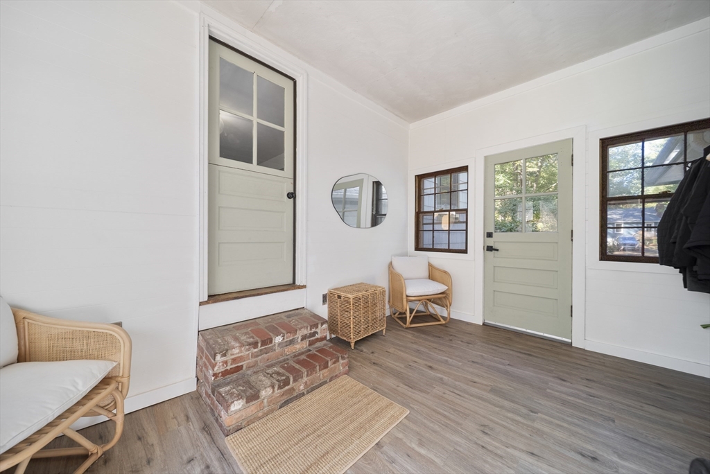 41 Searle Street Georgetown, MA 01833 - Photo 20 of 26 a living room with furniture and wooden floor